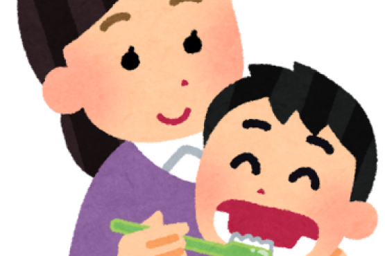 Mum brushing childs teeth